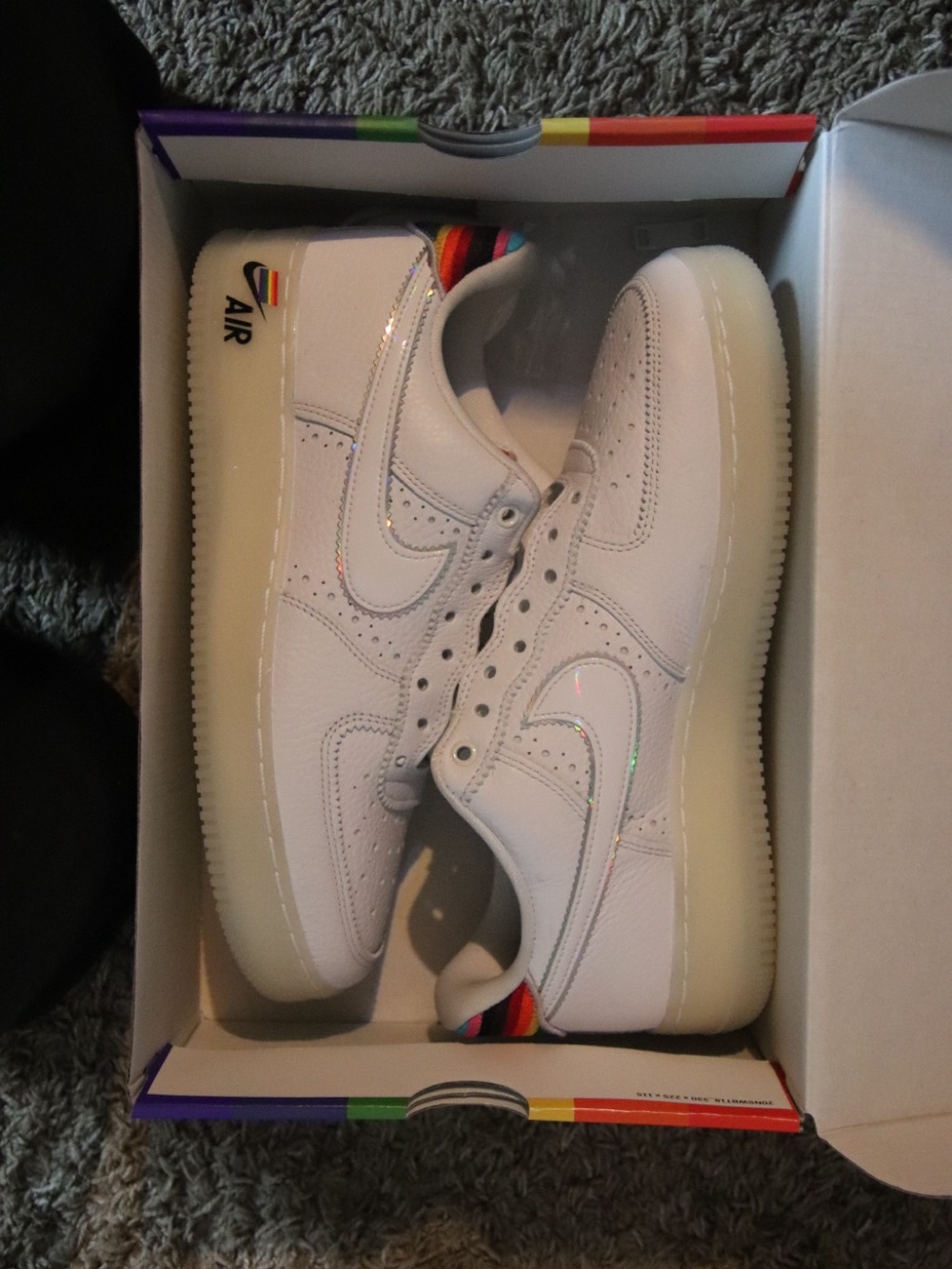 Nike Kids White Sneakers with Rainbow Heel Accent